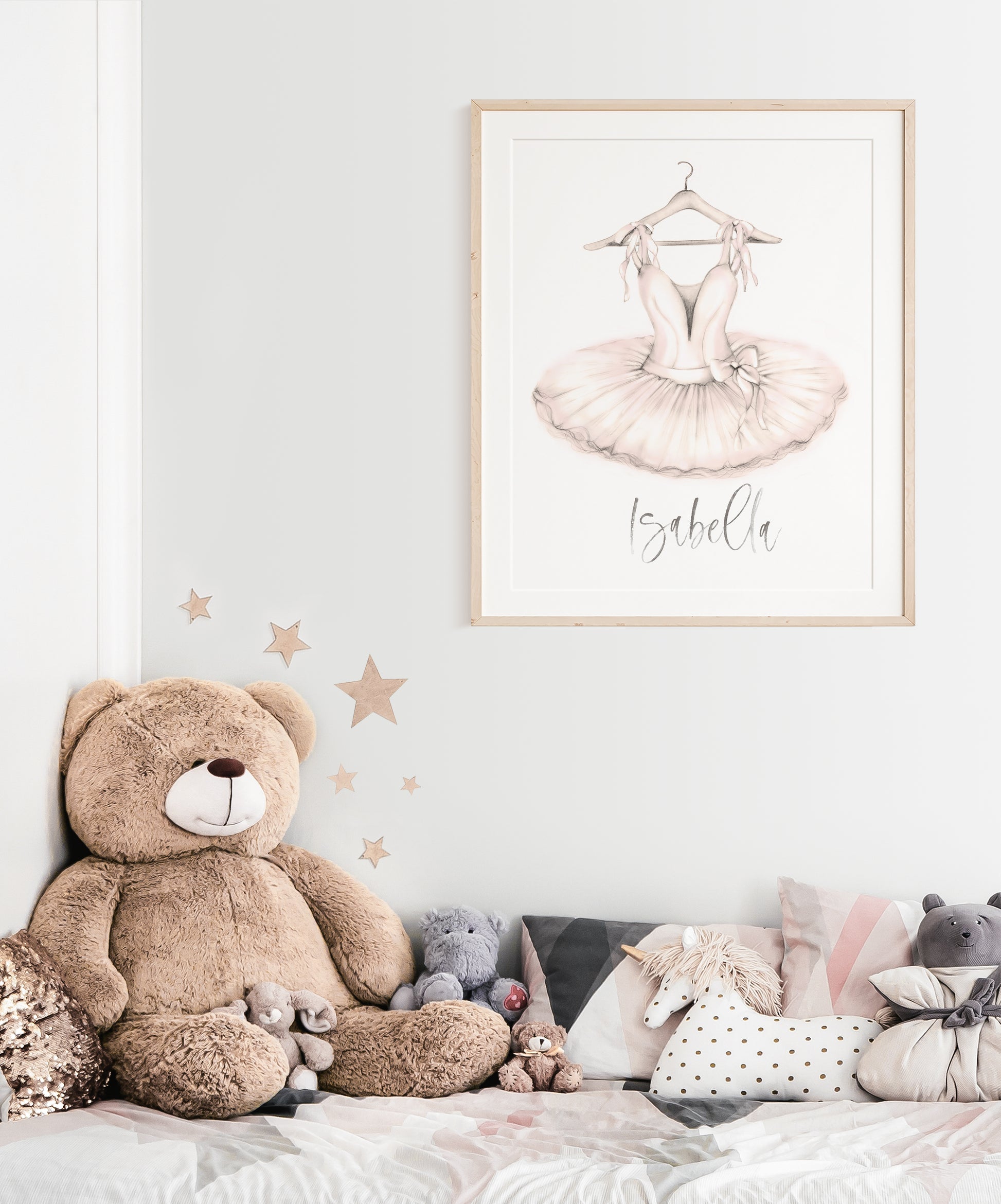 Picture of a ballet tutu drawing in a frame hanging on a wall next to a little girl's bed - Studio Q Art
